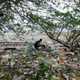All of that plastic that companies produce and use in packaging has to end up somewhere. For instance, this beach in Manila, Philippines.
